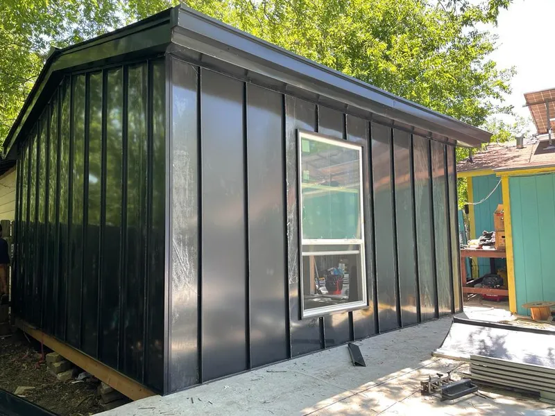 Black standing seam metal wall panels for Metal Roof Installation in Rose Hill