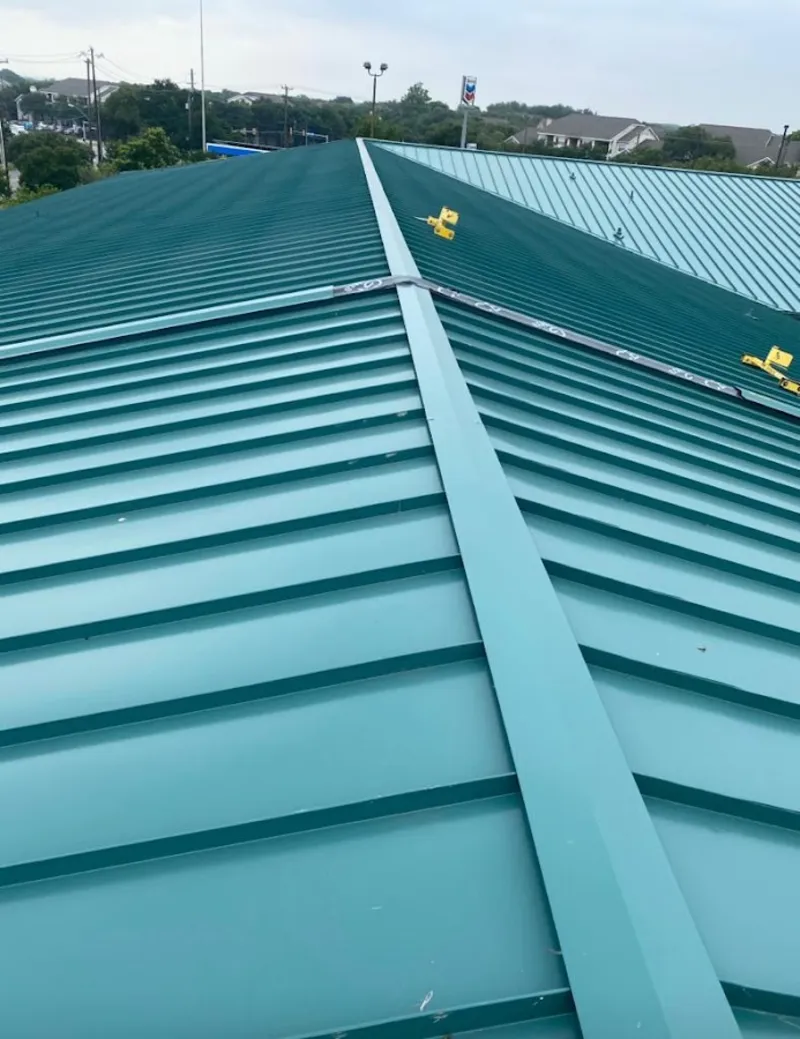 Green commercial metal roof ridge and valley for Metal Roof Repair in Rose Hill