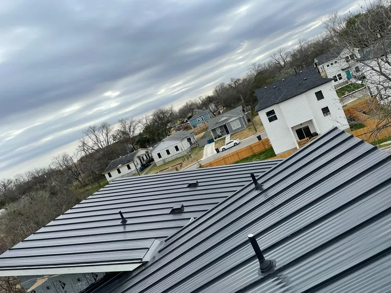 Standing seam metal roof panels with vents for Skylight Repair in Rose Hill